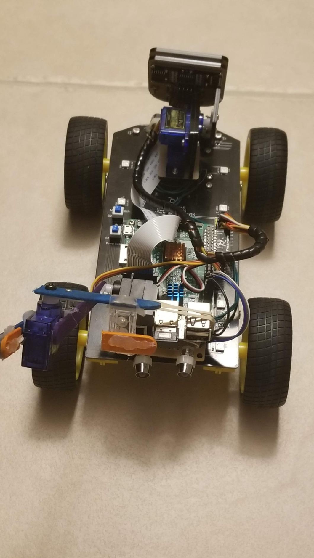 Freenove 4WD Smart Car Kit for Raspberry Pi 5 4 B 3 B+ Zero 2 W, Face Tracking, Line Tracking, Light Tracing, Obstacle Avoidance, App Control, Camera, Servo (Raspberry Pi NOT Included) customer photo 1