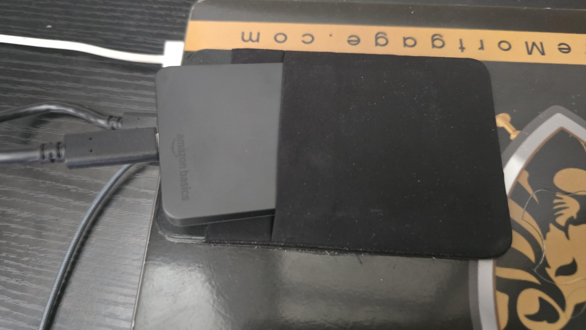 Amazon Basics Portable External SSD, 2TB, 2000MB/s Speeds, USB 3.2 Gen 2, IP65 Water & Dust Resistant, Black customer photo 1