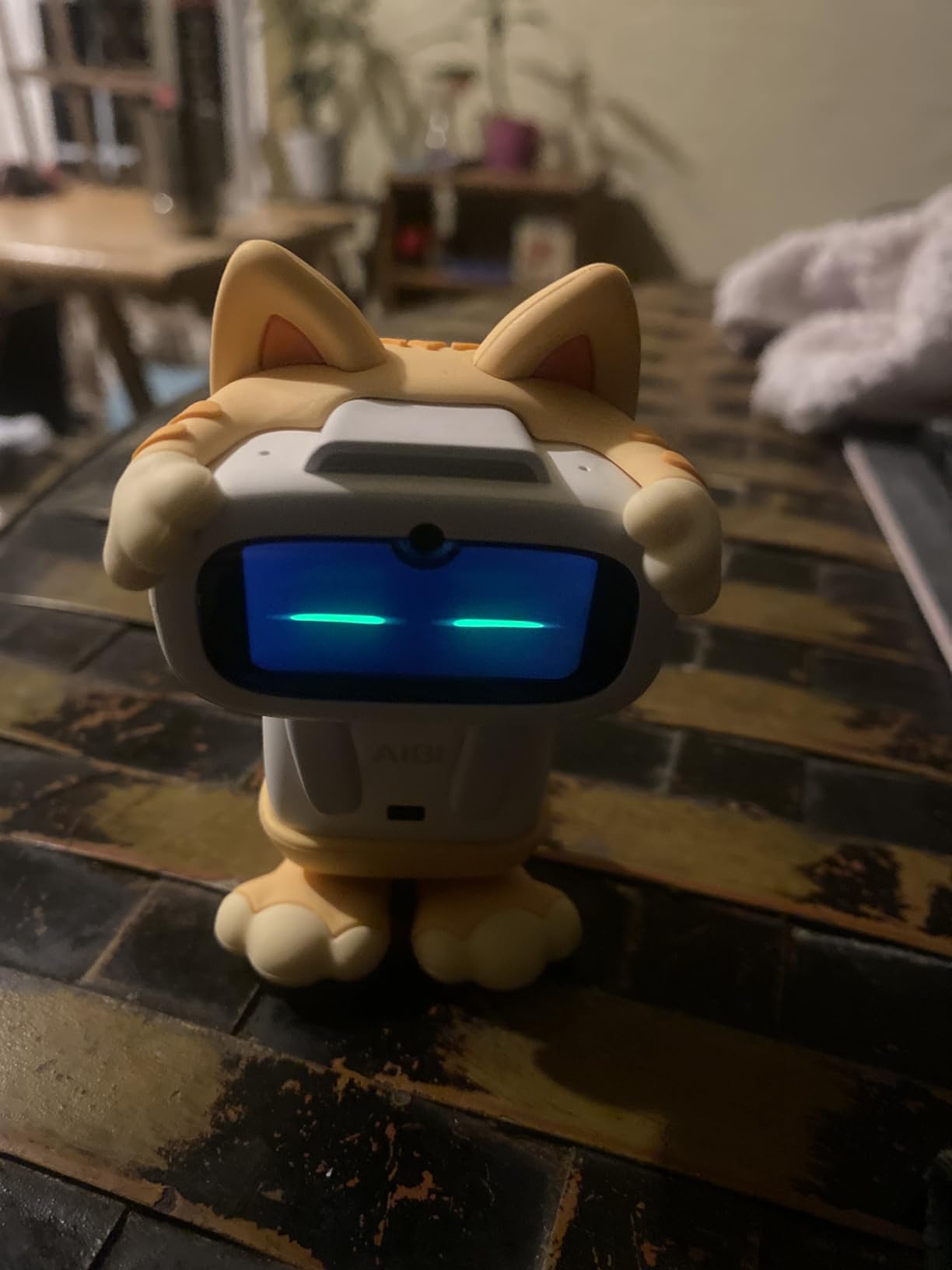 Aibi Pocket Pet - Wearable Robot | ChatGPT Powered AI Companion with Voice Commands, Emotional Interaction, Singing & Dancing | Magnetically Attaches to Anywhere | Ultra Portable customer photo 1
