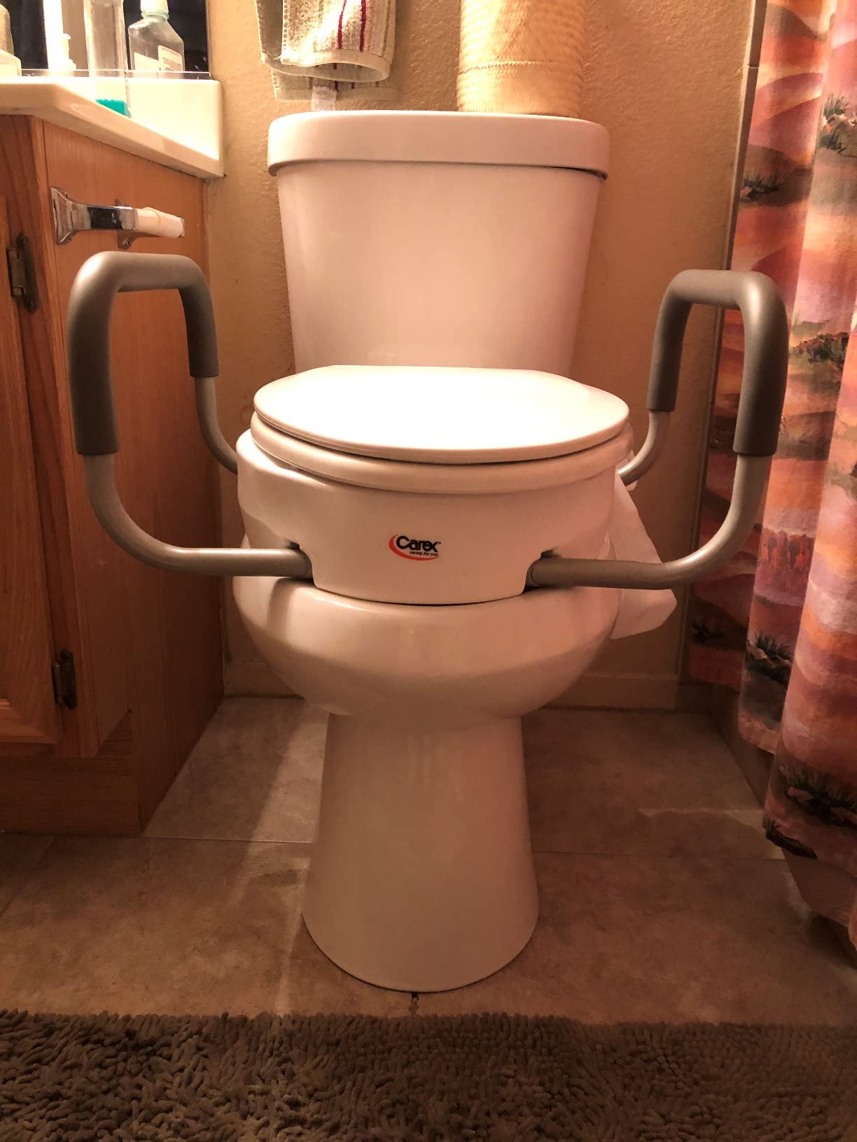 Carex 3.5 Inch Raised Toilet Seat with Arms, Round Toilet Seat Riser, 300 lbs Capacity, Elevating and Raising Seat for Elderly and Handicap, Universal, Slip-Resistant with Padded Handles, White customer photo 2