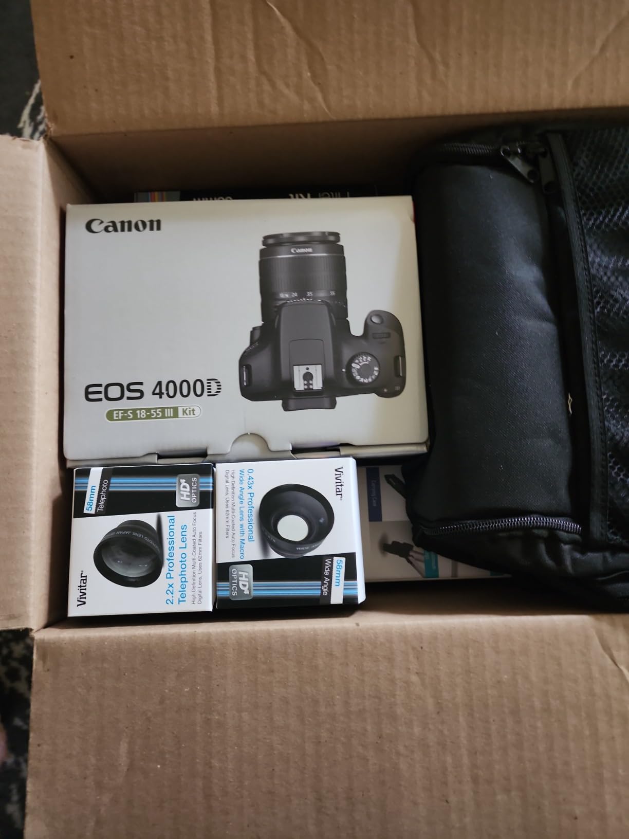 Canon EOS 4000D / Rebel T100 Digital SLR Camera Body w/Canon EF-S 18-55mm f/3.5-5.6 Lens 3 DSLR Kit Bundled with Complete Accessory Bundle + 64GB Flash & More - International Model (Renewed), Black customer photo 2